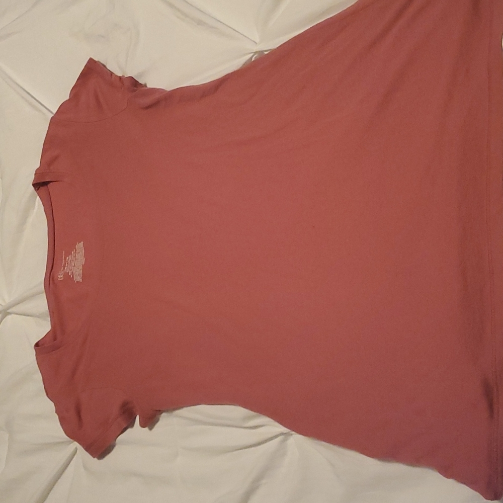 Shirt sleeved peach colored shirt